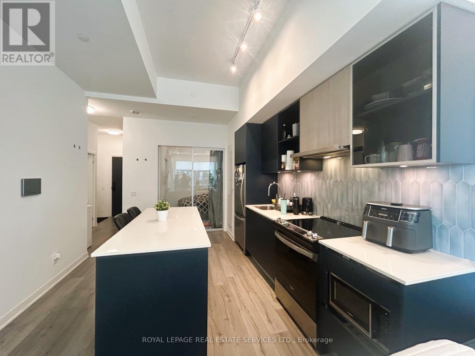 223 - 405 Dundas Street W, Oakville, Ontario  L6M 5P9 - Photo 7 - W12457490