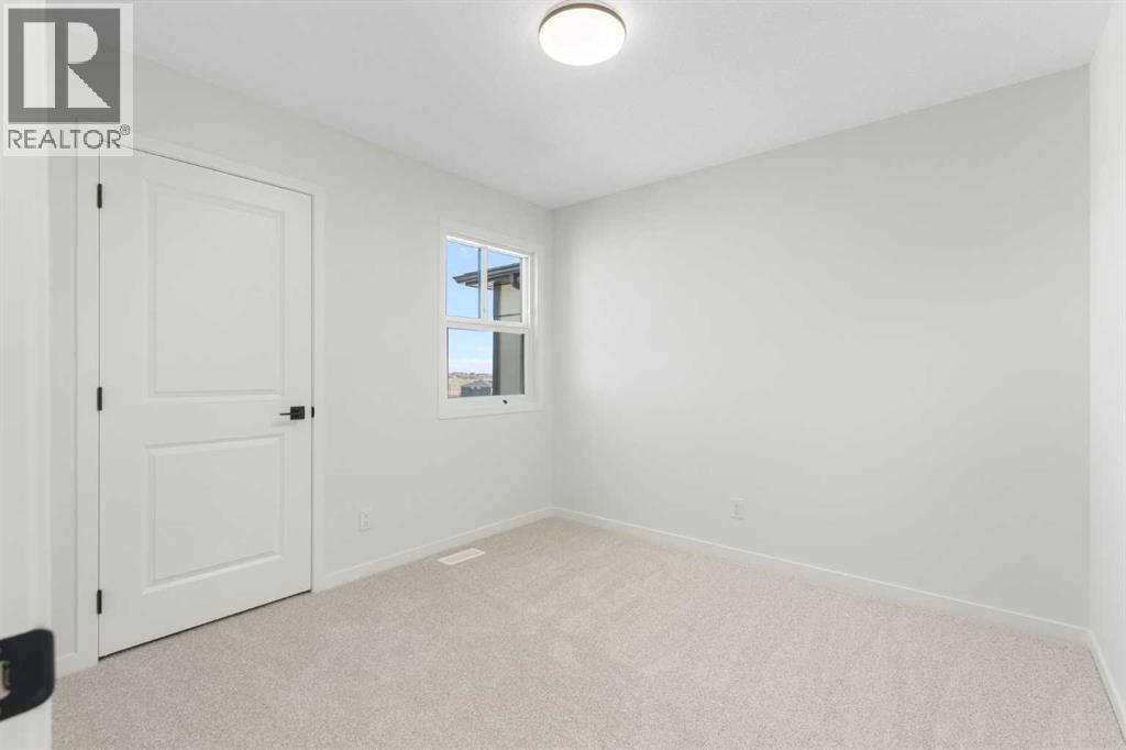 17 Marmot Passage Nw, Calgary, Alberta  T3R 2J3 - Photo 22 - A2263666