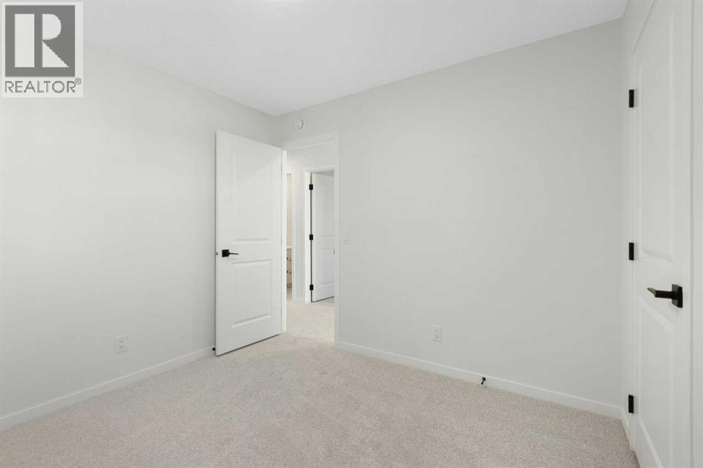 17 Marmot Passage Nw, Calgary, Alberta  T3R 2J3 - Photo 23 - A2263666