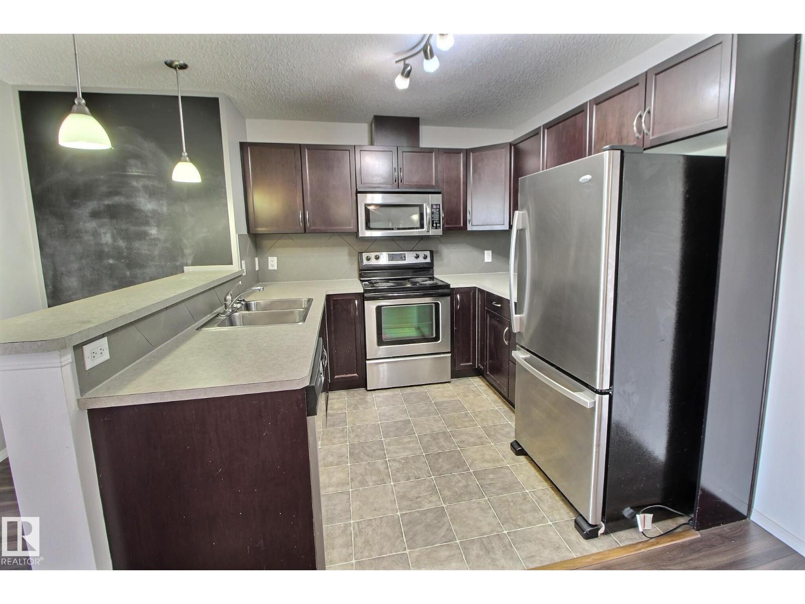 #205 5951 165 Av Nw, Edmonton, Alberta  T5Y 0J6 - Photo 1 - E4461777