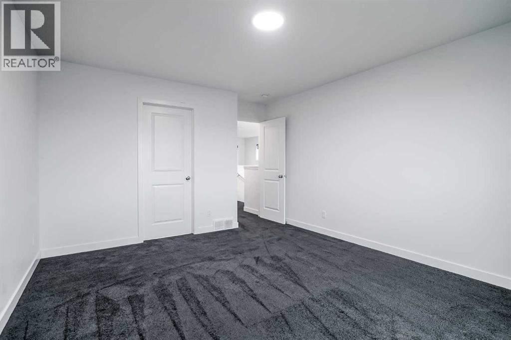 34 Belmont Crescent Sw, Calgary, Alberta  T2X 4N5 - Photo 23 - A2253410