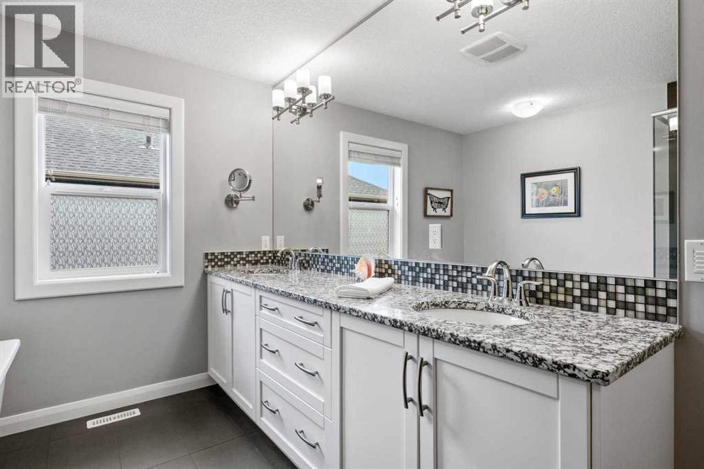 136 Kinniburgh Drive, Chestermere, Alberta  T1X 0T8 - Photo 29 - A2232363