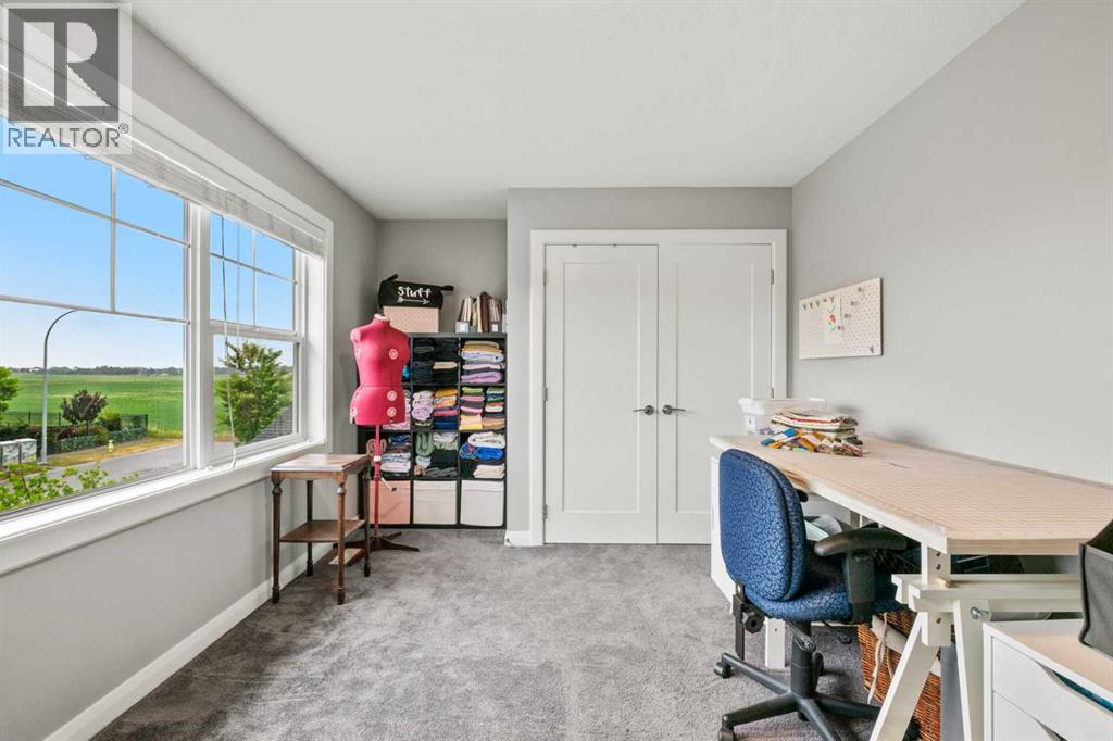 136 Kinniburgh Drive, Chestermere, Alberta  T1X 0T8 - Photo 35 - A2232363