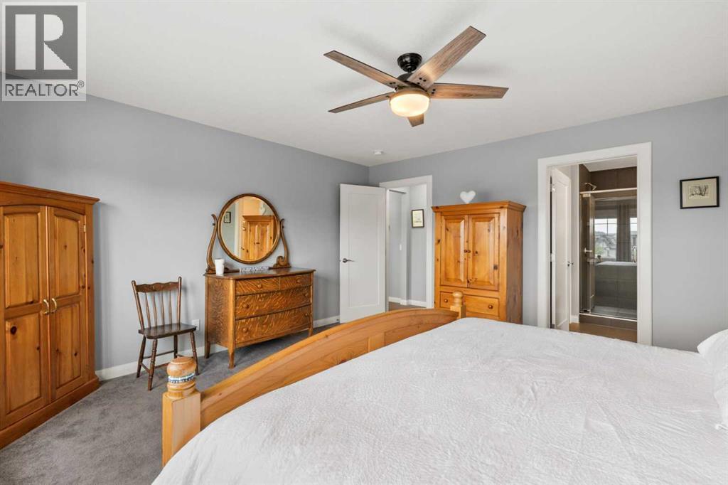 136 Kinniburgh Drive, Chestermere, Alberta  T1X 0T8 - Photo 26 - A2232363