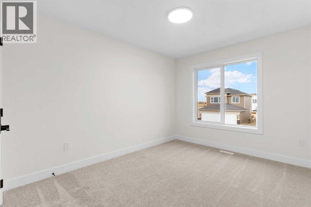 706 Mandalay Link, Carstairs, Alberta  T0M 0N0 - Photo 10 - A2263643