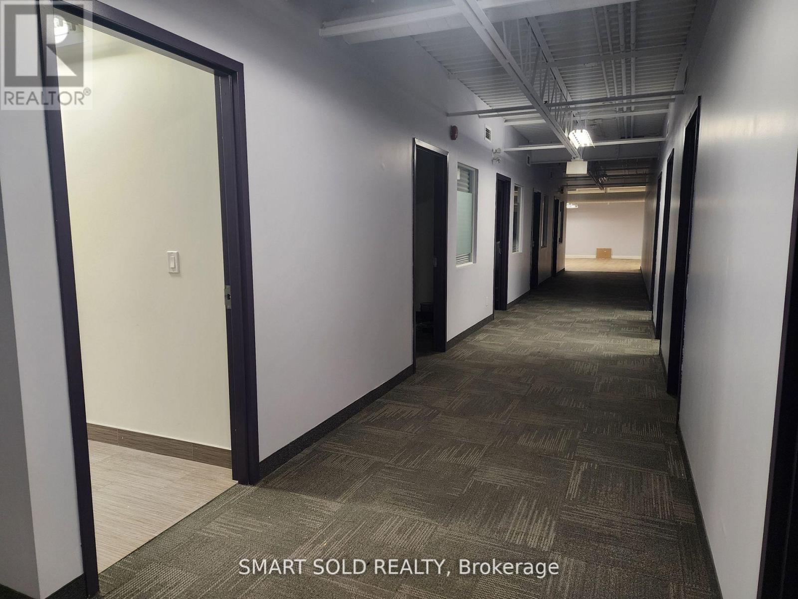203 - 70 Valleywood Drive, Markham, Ontario  L3R 4T5 - Photo 4 - N12457961