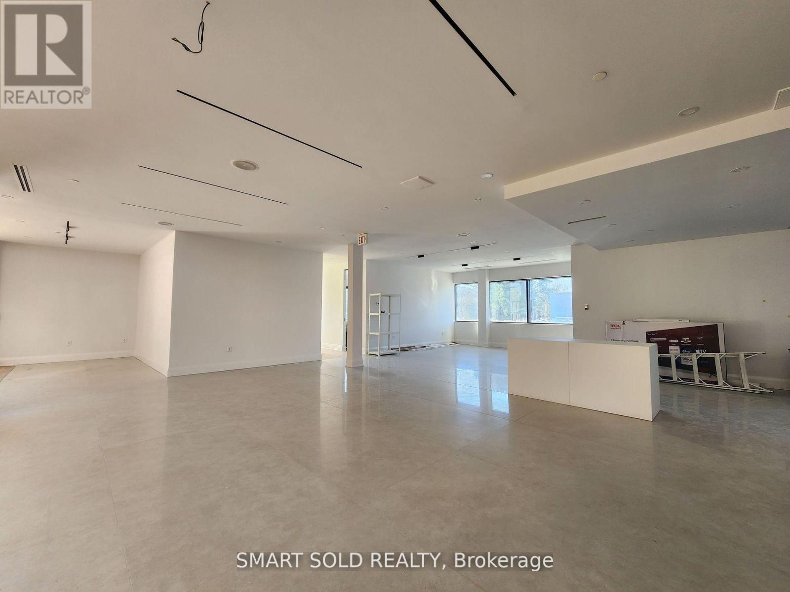 203 - 70 Valleywood Drive, Markham, Ontario  L3R 4T5 - Photo 8 - N12457961