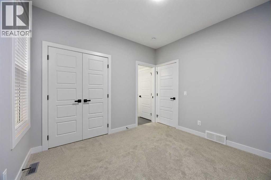 97 Amblehurst Gardens Nw, Calgary, Alberta  T3P 1Z9 - Photo 11 - A2263714