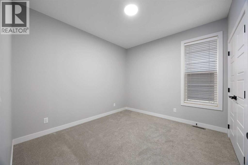 97 Amblehurst Gardens Nw, Calgary, Alberta  T3P 1Z9 - Photo 9 - A2263714