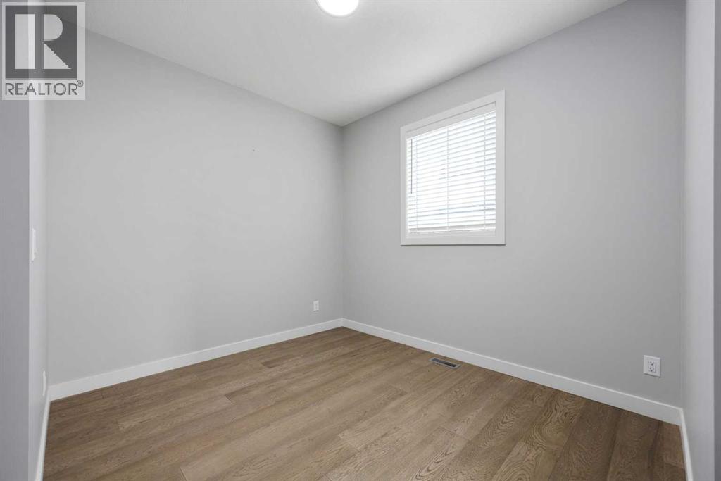 97 Amblehurst Gardens Nw, Calgary, Alberta  T3P 1Z9 - Photo 7 - A2263714