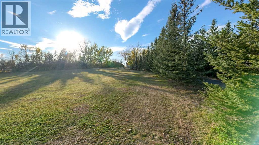 247 Shore Drive, Rural Rocky View County, Alberta  T2M 4L5 - Photo 9 - A2262909