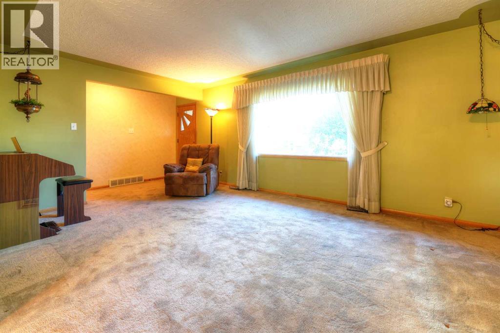 71 Rosery Drive Nw, Calgary, Alberta  T2K 1L4 - Photo 11 - A2263718