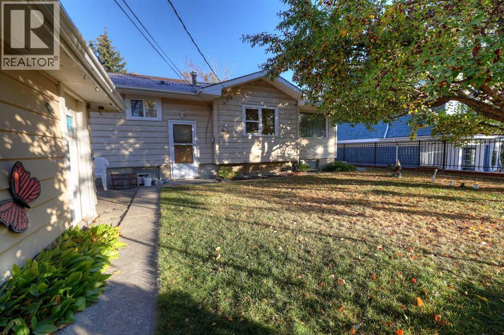 71 Rosery Drive Nw, Calgary, Alberta  T2K 1L4 - Photo 5 - A2263718
