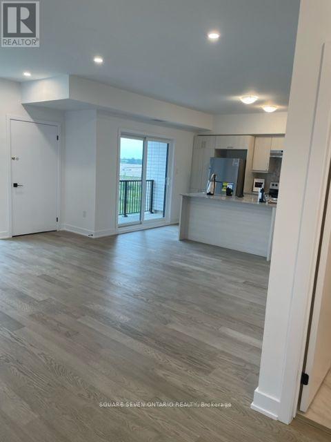 414 - 1 Chef Lane, Barrie, Ontario  L9J 0T1 - Photo 2 - S12458061