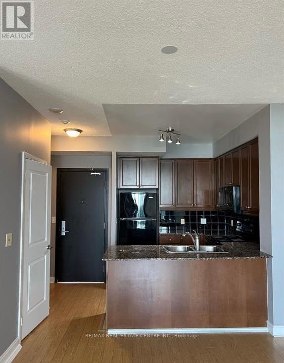 1302 - 70 Absolute Avenue, Mississauga, Ontario  L4Z 0A4 - Photo 6 - W12458064