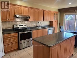 18 Fairhill Avenue, Brampton, Ontario  L7A 2A9 - Photo 5 - W12458088