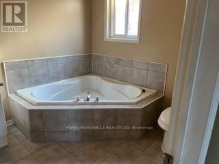 18 Fairhill Avenue, Brampton, Ontario  L7A 2A9 - Photo 9 - W12458088