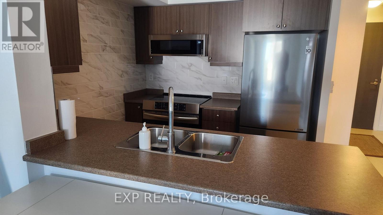 1217 - 1346 Danforth Road, Toronto, Ontario  M1J 0A9 - Photo 5 - E12458122