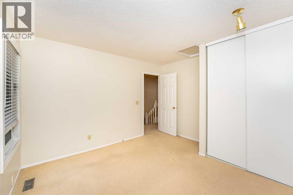 215 Coachway Lane Sw, Calgary, Alberta  T3H 2V9 - Photo 30 - A2262406