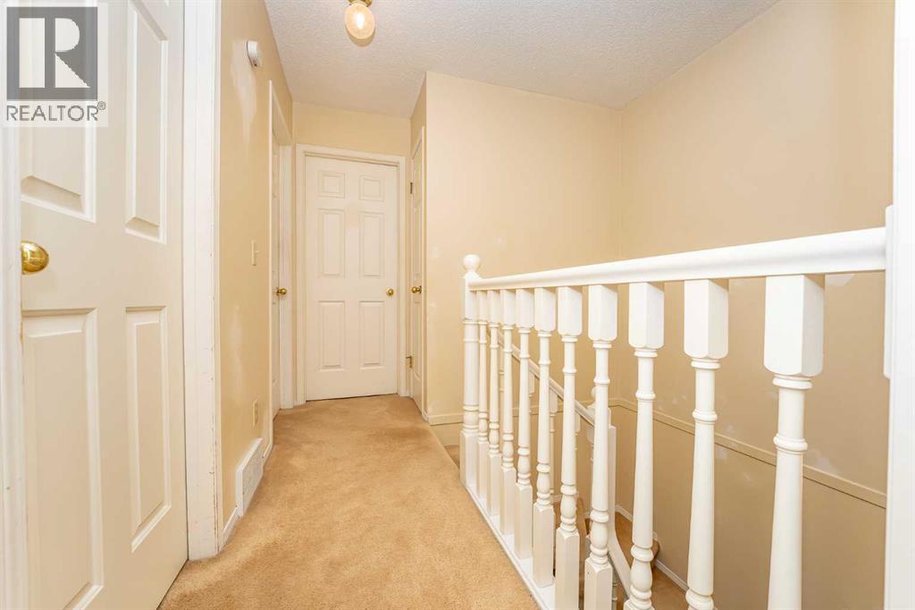 215 Coachway Lane Sw, Calgary, Alberta  T3H 2V9 - Photo 34 - A2262406