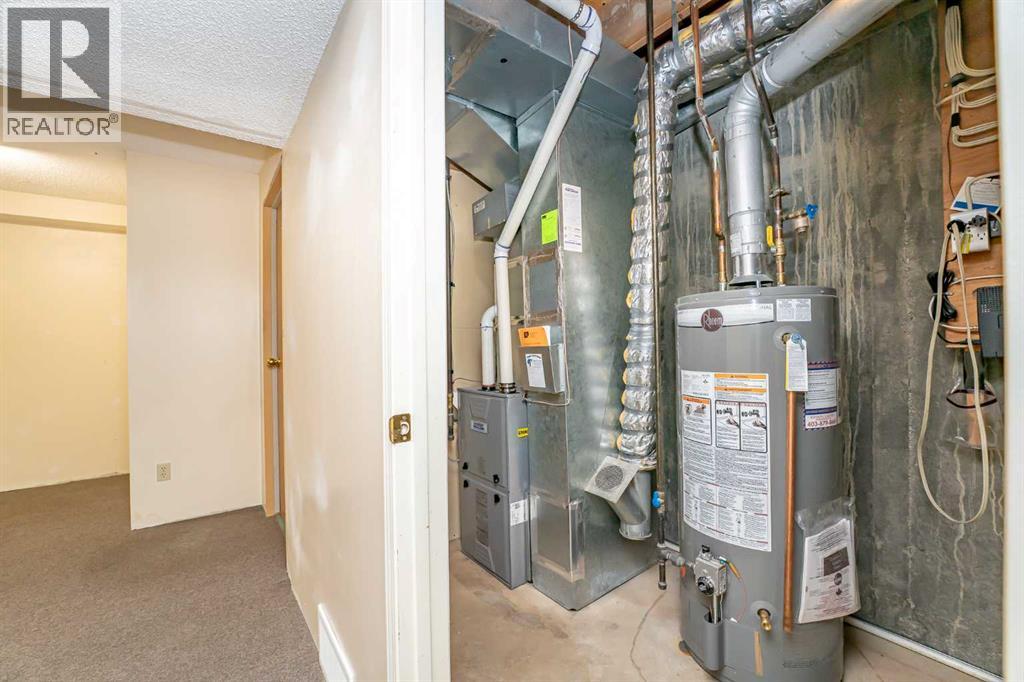 215 Coachway Lane Sw, Calgary, Alberta  T3H 2V9 - Photo 39 - A2262406
