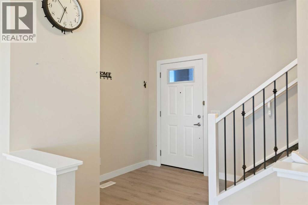 818 Hampshire Crescent Ne, High River, Alberta  T1V 0E4 - Photo 6 - A2247873