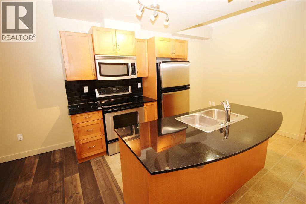 1708, 11811 Lake Fraser Drive Se, Calgary, Alberta  T2J 7J4 - Photo 4 - A2263976