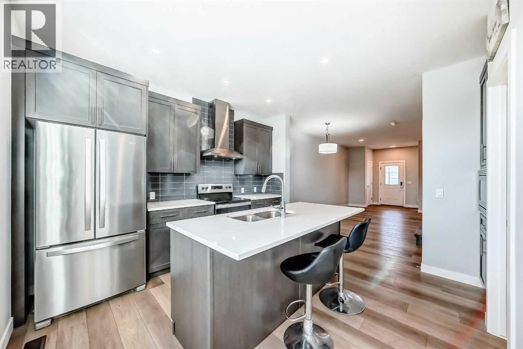 124 Chelsea Glen, Chestermere, Alberta  T1X 2P4 - Photo 6 - A2258924