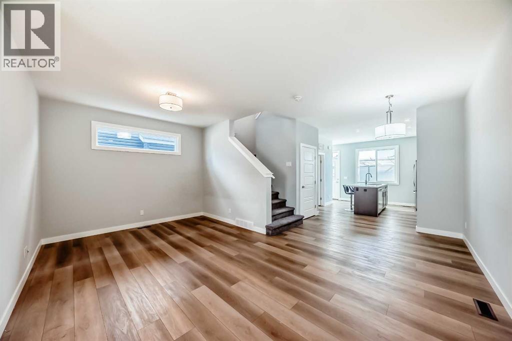 124 Chelsea Glen, Chestermere, Alberta  T1X 2P4 - Photo 9 - A2258924