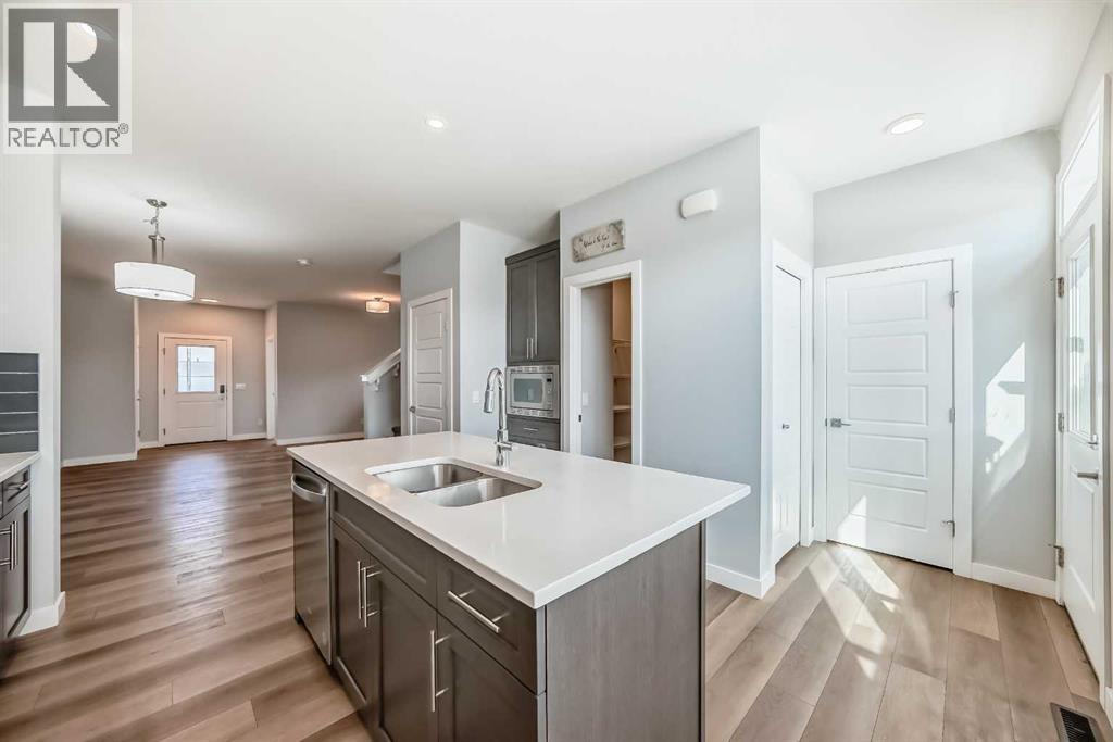 124 Chelsea Glen, Chestermere, Alberta  T1X 2P4 - Photo 5 - A2258924