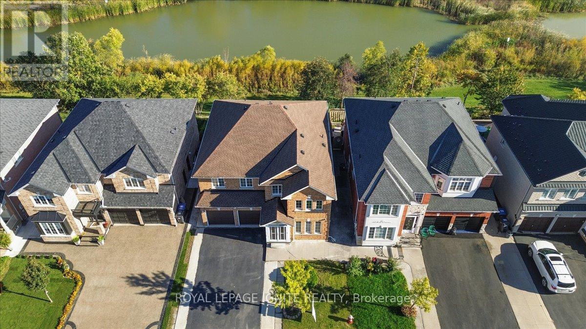 63 Eastbrook Way, Brampton, Ontario  L6P 1K6 - Photo 2 - W12458287