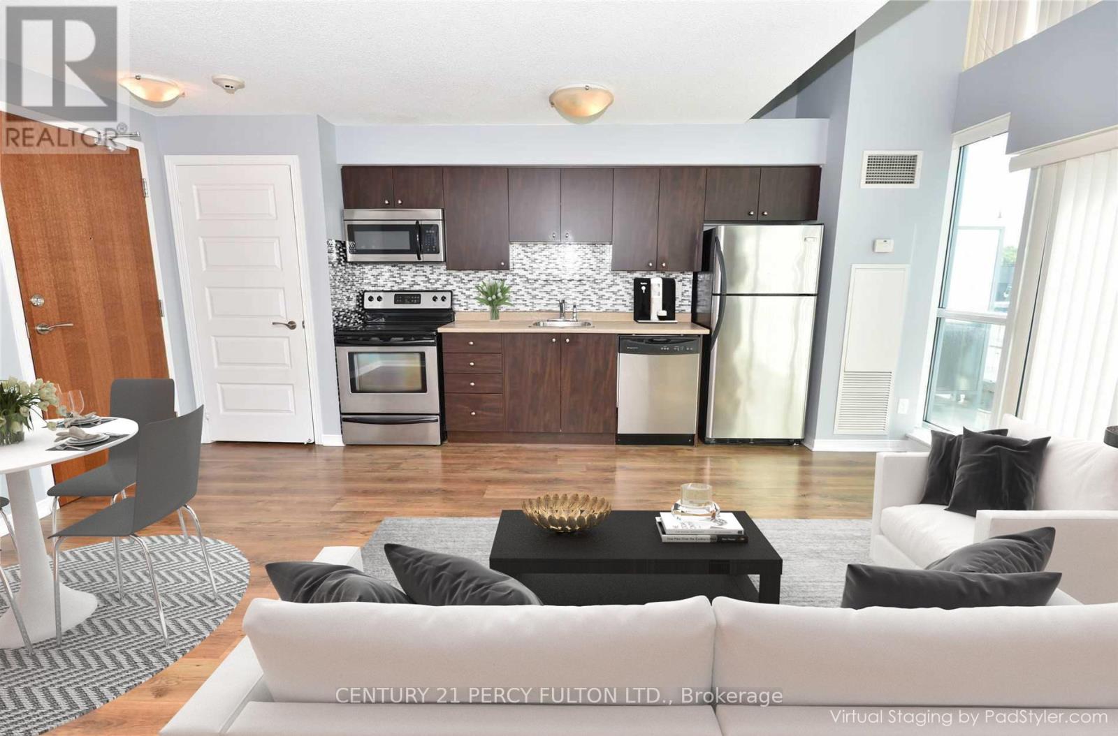 218 - 215 Queen Street E, Brampton, Ontario  L6W 0A9 - Photo 2 - W12446813