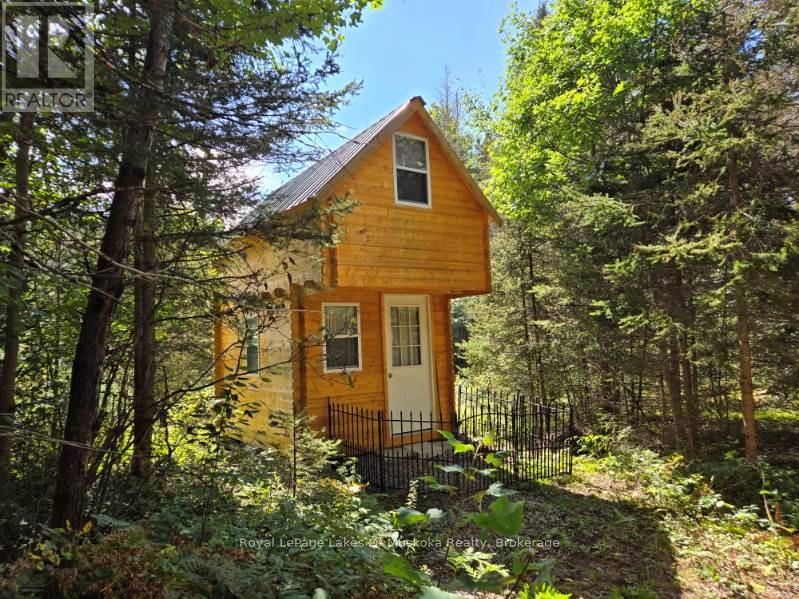 77 Grindstone Road, Magnetawan, Ontario  P0A 1Z0 - Photo 2 - X12458398