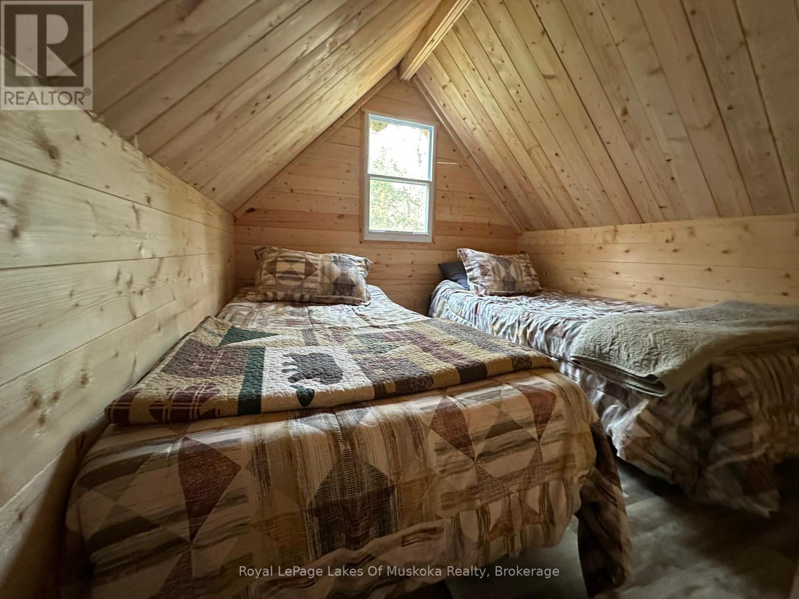 77 Grindstone Road, Magnetawan, Ontario  P0A 1Z0 - Photo 4 - X12458398