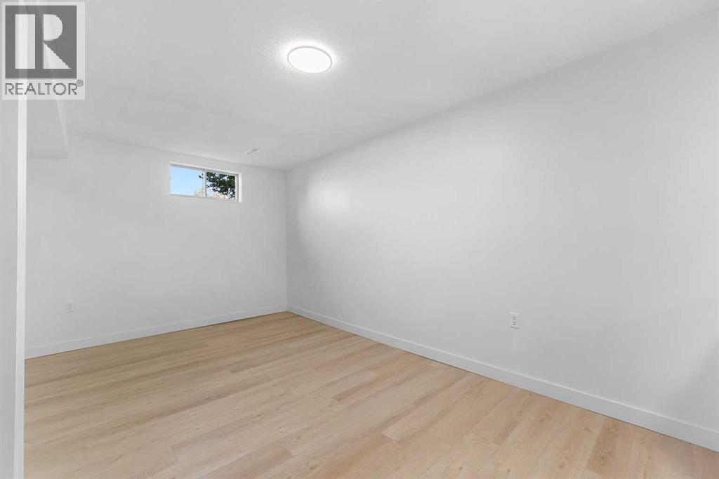 966 Berkley Drive Nw, Calgary, Alberta  T3K 1A2 - Photo 35 - A2257028