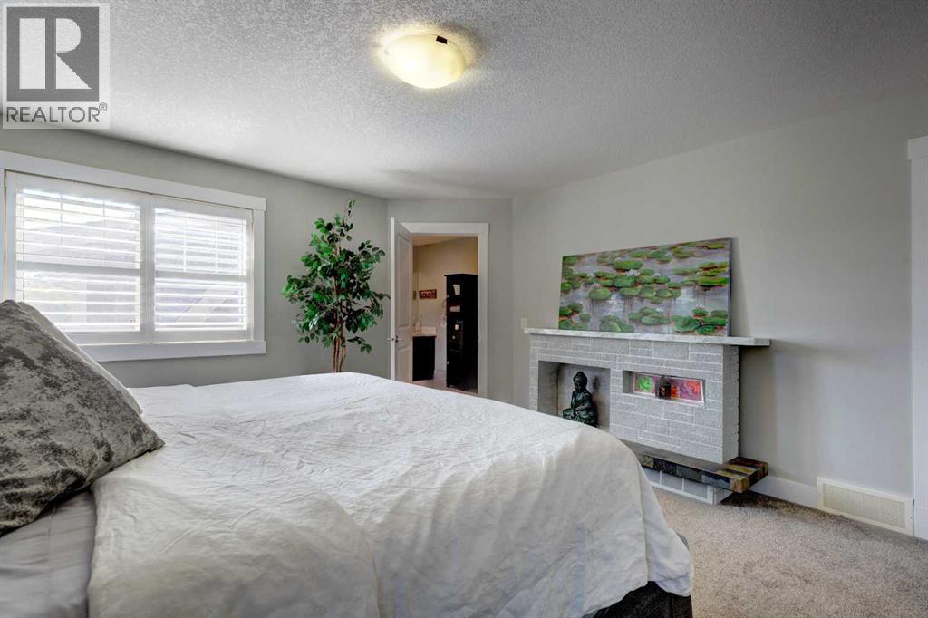 152 Mike Ralph Way Sw, Calgary, Alberta  T3E 7P2 - Photo 17 - A2254640