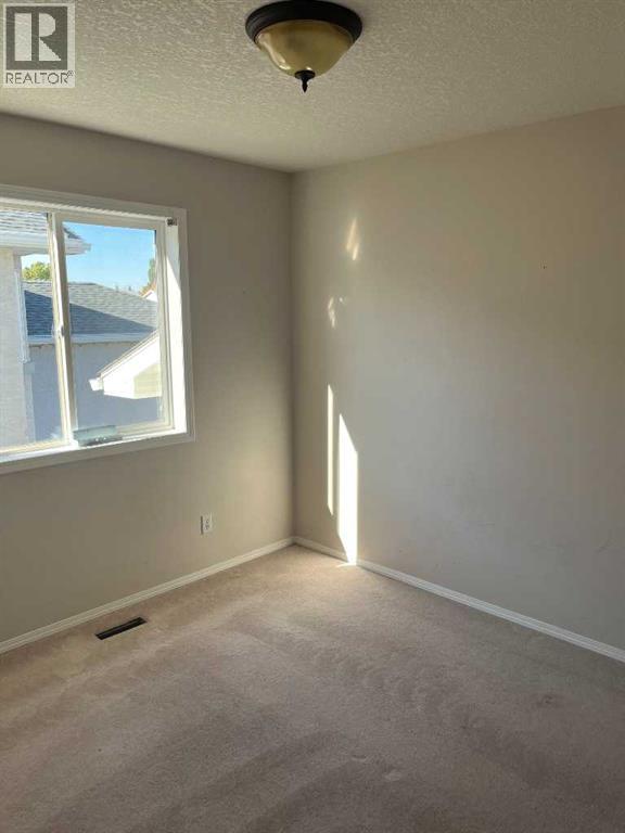 64 Ermineview Way N, Lethbridge, Alberta  T1H 6M8 - Photo 11 - A2263537