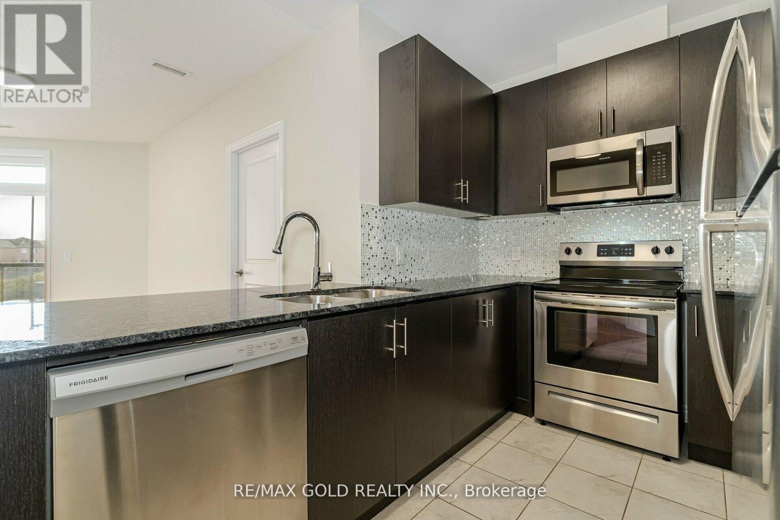 209 - 39 New Delhi Drive, Markham, Ontario  L3S 0E1 - Photo 9 - N12458620