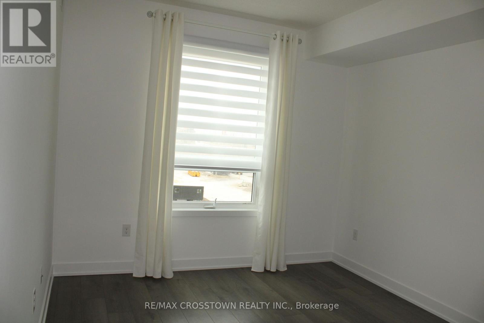 408 - 6 Spice Way, Barrie, Ontario  L9J 0J9 - Photo 11 - S12458657