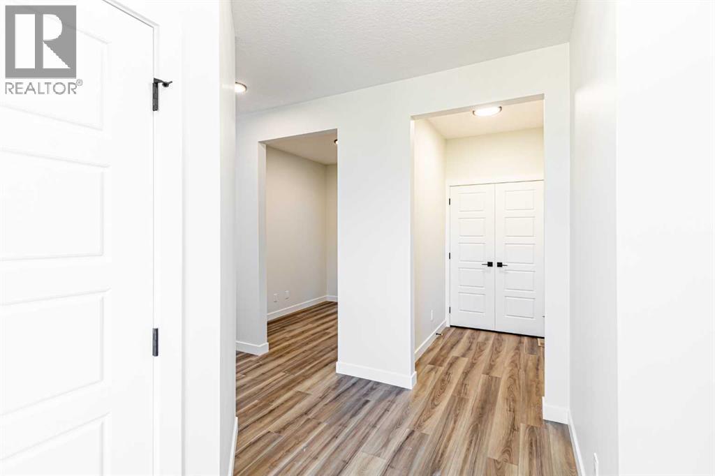 34 Amblefield Heights Nw, Calgary, Alberta  T3P 2K1 - Photo 4 - A2262597