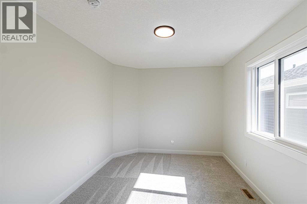 34 Amblefield Heights Nw, Calgary, Alberta  T3P 2K1 - Photo 18 - A2262597