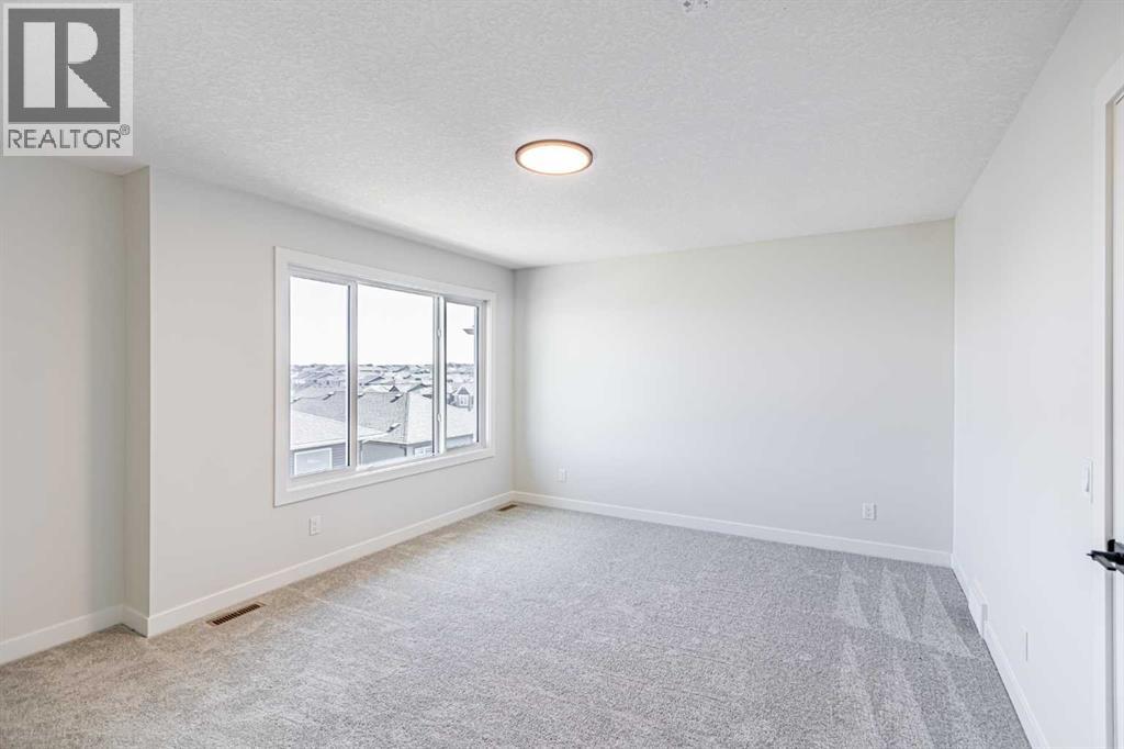 34 Amblefield Heights Nw, Calgary, Alberta  T3P 2K1 - Photo 20 - A2262597