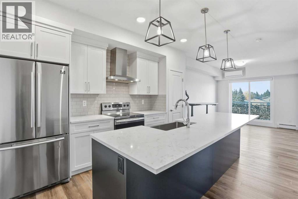 413, 300 Harvest Hills Place Ne, Calgary, Alberta  T3K 2P4 - Photo 2 - A2264008