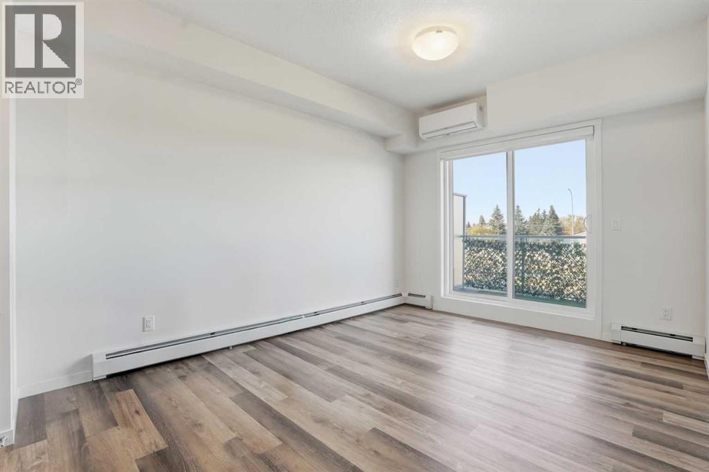 413, 300 Harvest Hills Place Ne, Calgary, Alberta  T3K 2P4 - Photo 6 - A2264008