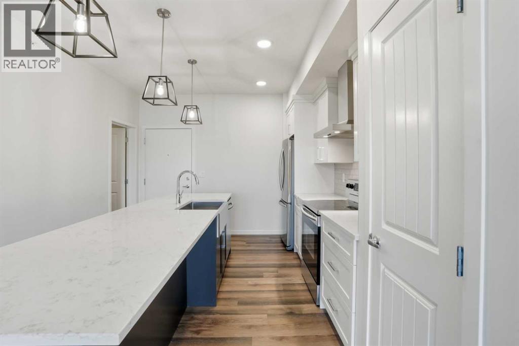 413, 300 Harvest Hills Place Ne, Calgary, Alberta  T3K 2P4 - Photo 3 - A2264008