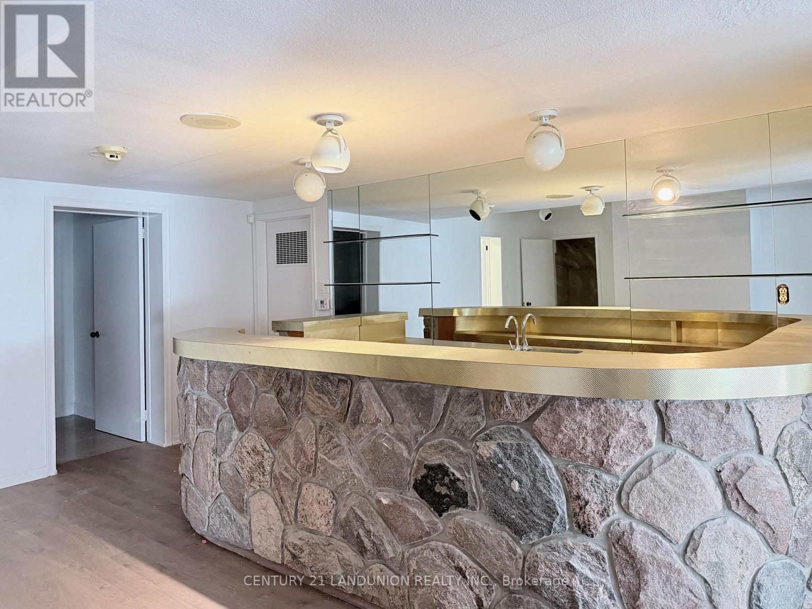 Unit 2 - 1 Caldy Court, Toronto, Ontario  M2L 2J5 - Photo 5 - C12458723