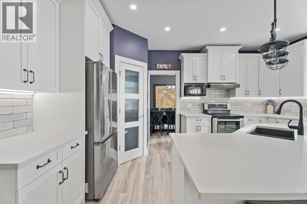 15 Drake Landing Drive, Okotoks, Alberta  T1S 2M7 - Photo 7 - A2255305