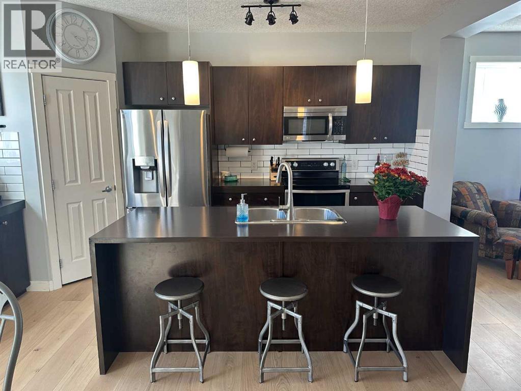 64 Elgin Meadows Manor Se, Calgary, Alberta  T2Z 0S1 - Photo 3 - A2263862