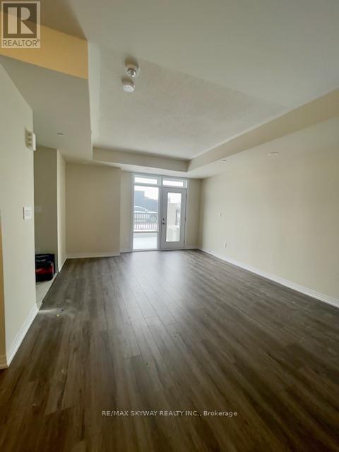 123 - 1589 Rose Way, Milton, Ontario  L9E 1N4 - Photo 2 - W12458927
