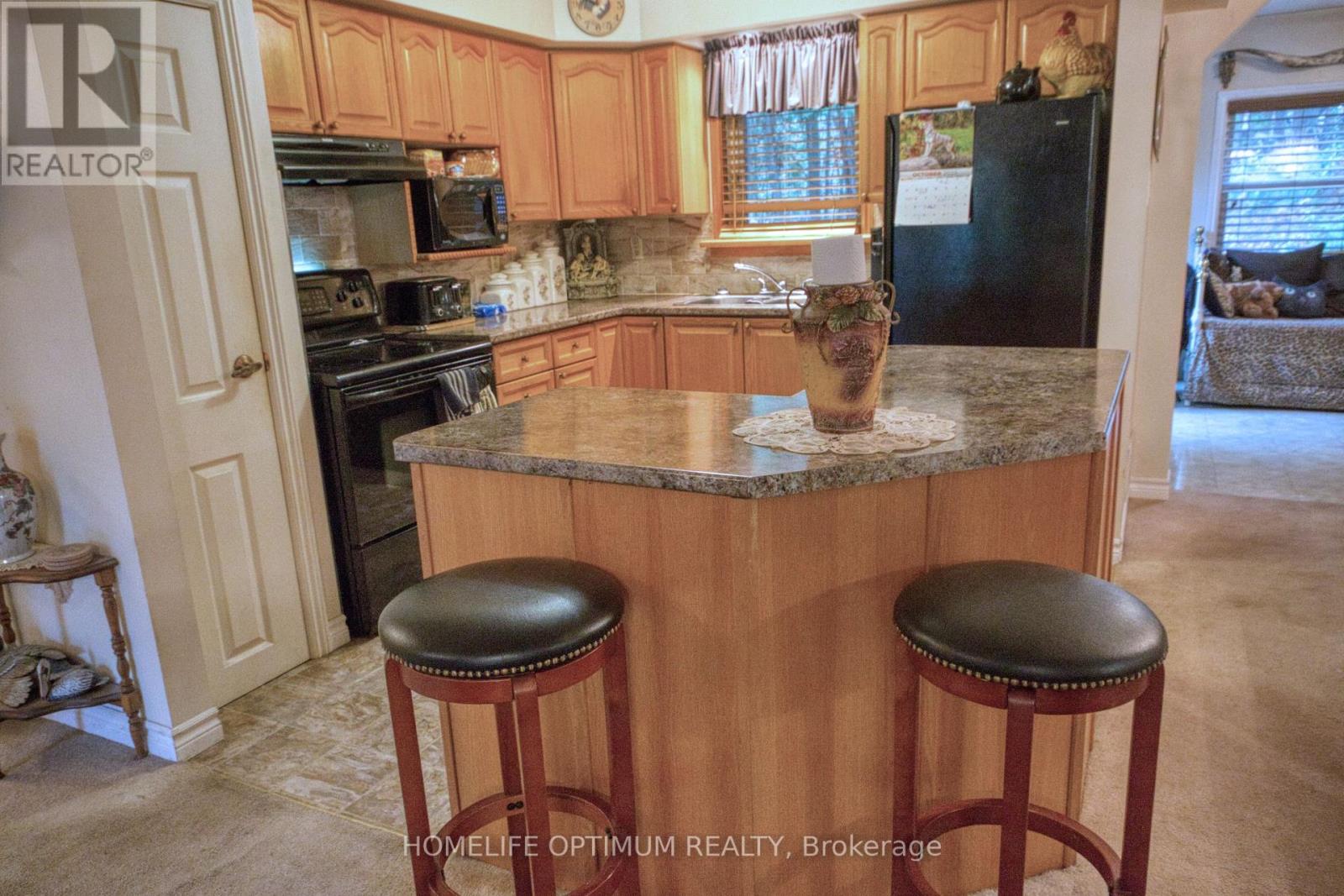 228 Pirates Glen Drive, Trent Lakes, Ontario  K0M 1A0 - Photo 17 - X12451077